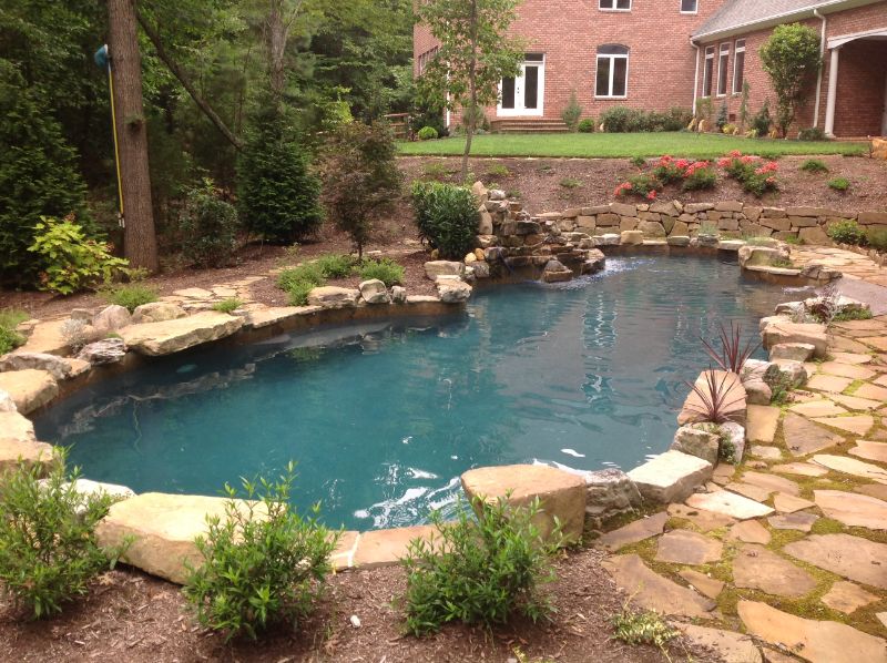 Lagoon Pools: Design Ideas, Pros/Cons & More - Pool Research