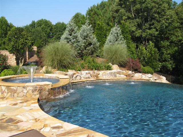 freeform pool with fountain in spa